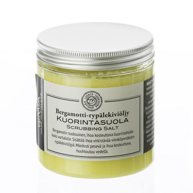 Osmia Kuorintasuola Bergamotti-rypälekiviöljy 300 gramman läpinäkyvässä purkissa, jossa metallinen kierrekansi. 